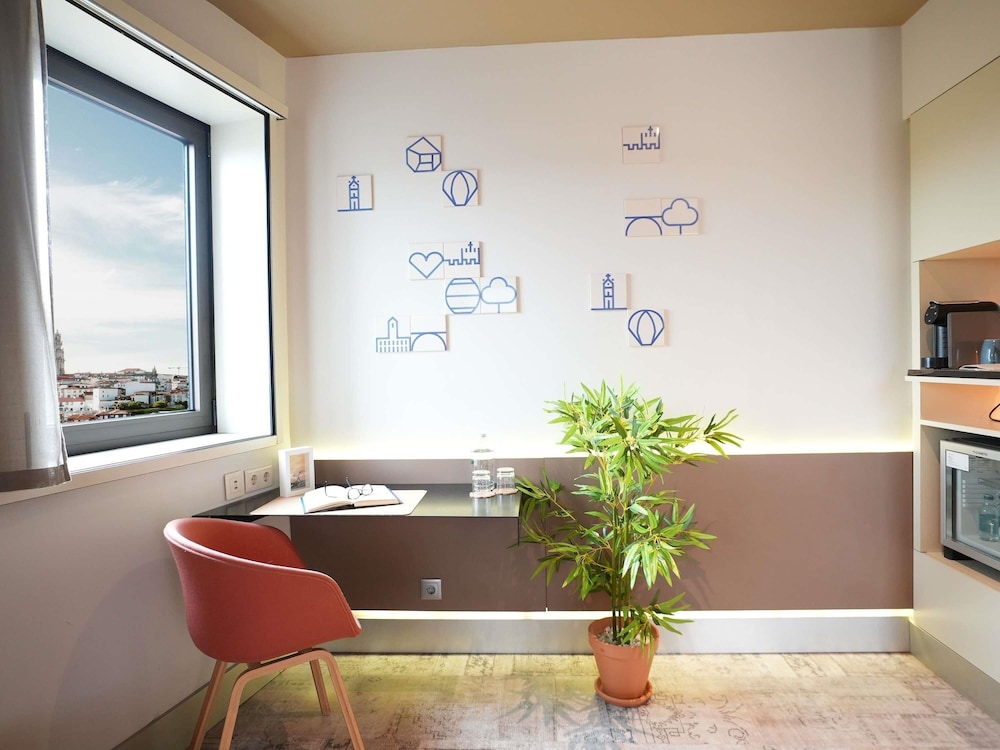 Suite junior, 1 cama doble con sofá cama del hotel Mercure Porto Centro Santa Catarina. Foto 5