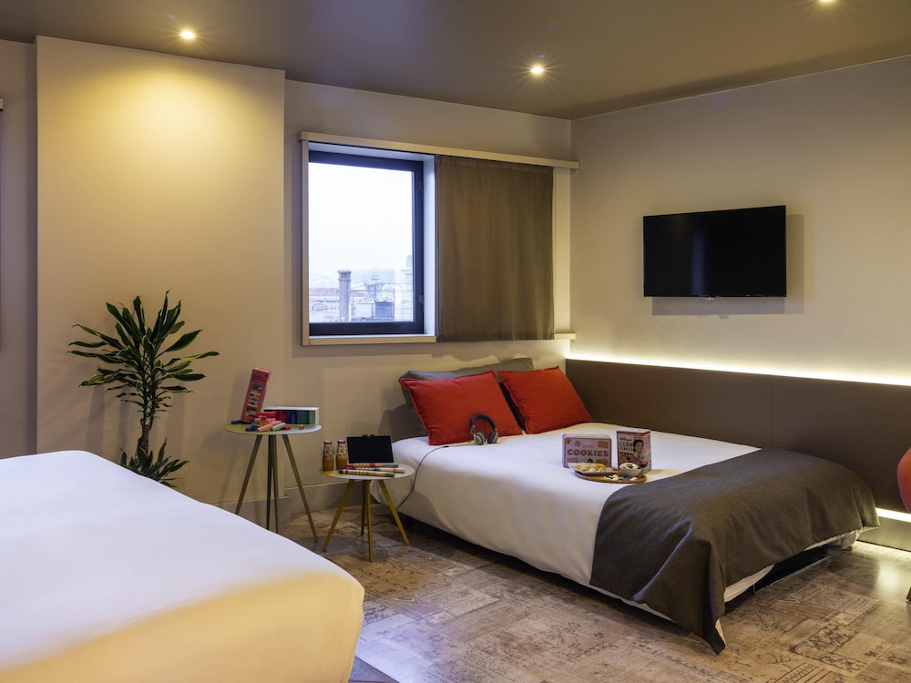 Suite familiar, 1 cama doble con sofá cama del hotel Mercure Porto Centro Santa Catarina. Foto 13