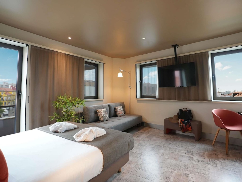 Suite junior, 1 cama doble con sofá cama del hotel Mercure Porto Centro Santa Catarina. Foto 13