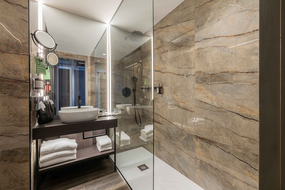 Habitación Deluxe, 1 cama de matrimonio grande del hotel Hf Ipanema Porto. Foto 2