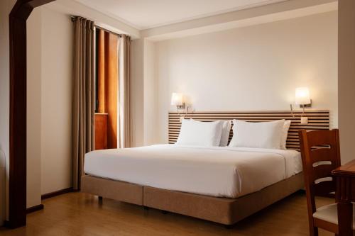 Habitación Superior con cama extragrande del hotel Da Bolsa. Foto 3