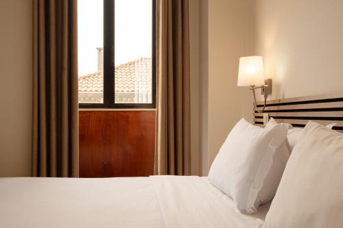 Habitación Superior con cama extragrande del hotel Da Bolsa. Foto 5