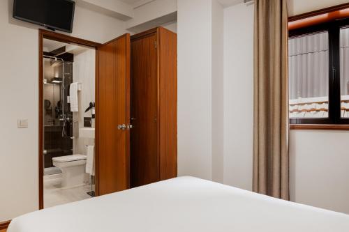 Habitación Doble Pequeña del hotel Da Bolsa. Foto 1