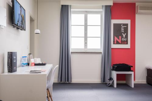 Habitación Triple del hotel Stay Évora Centro. Foto 1