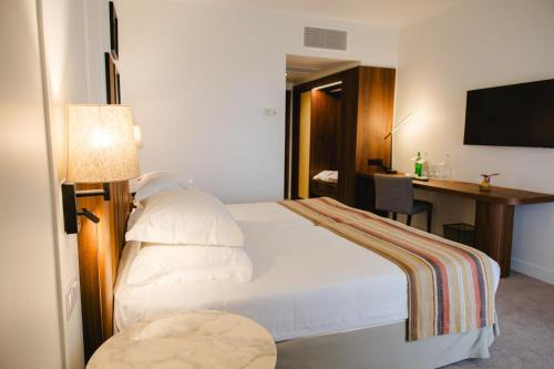 Habitación Doble Prestige - 2 camas del hotel Evora. Foto 2