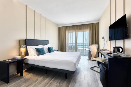 Alojamiento Prémium con 1 cama doble - Frente al mar - No fumadores del hotel Tryp By Wyndham Lisboa Caparica Mar