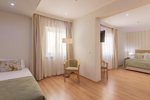 Habitación Doble con cama supletoria - 1 o 2 camas del hotel Luna Esperança Centro. Foto 4