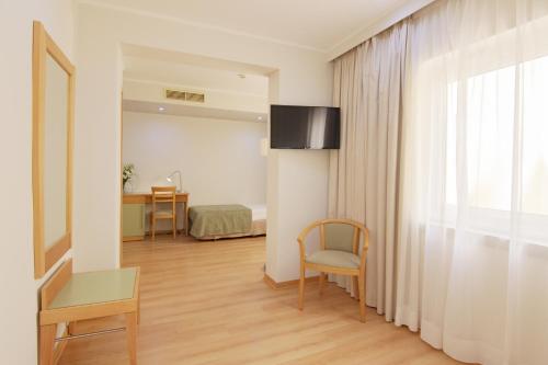 Habitación Doble con cama supletoria - 1 o 2 camas del hotel Luna Esperança Centro. Foto 5