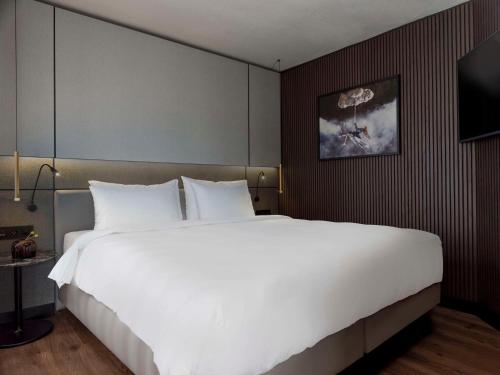 Suite Vista Lago 1 Cama queen del hotel Radisson Blu Royal Viking , Stockholm. Foto 1