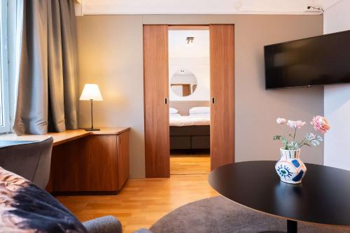 Suite Junior con cama extragrande del hotel Best Western Plus Park City Solna