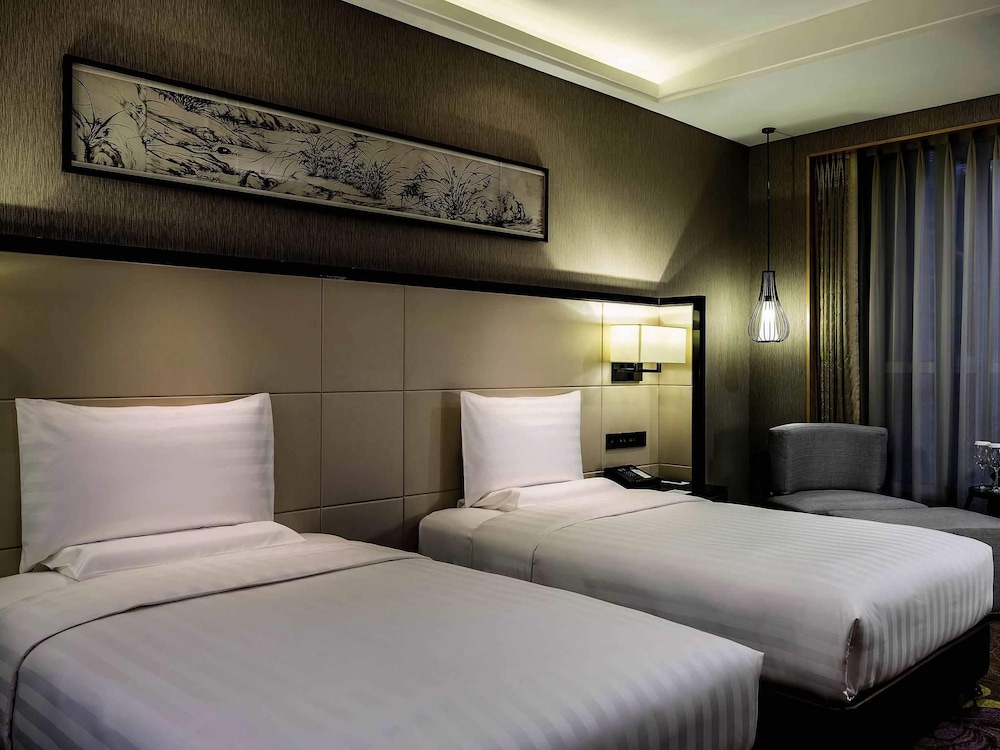 Habitación Deluxe, 2 camas individuales, Acceso al salón del club (Executive) del hotel Pullman Qingdao Ziyue