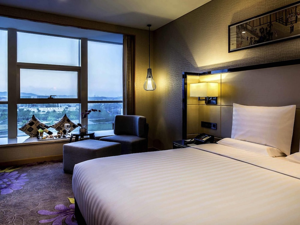Suite Deluxe, 1 cama de matrimonio grande, Acceso al salón del club del hotel Pullman Qingdao Ziyue