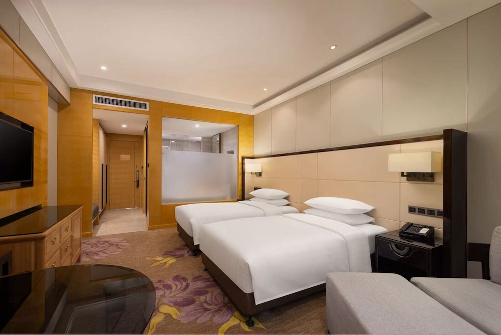 Habitación superior, 2 camas individuales del hotel Pullman Qingdao Ziyue. Foto 2