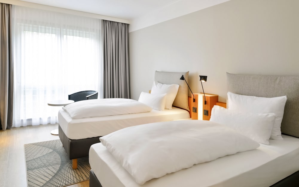 Habitación estándar con 2 camas individuales del hotel Mercure Kamen Unna. Foto 1