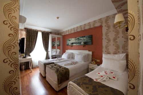 Habitación Triple del hotel Golden Horn - Special Class. Foto 3