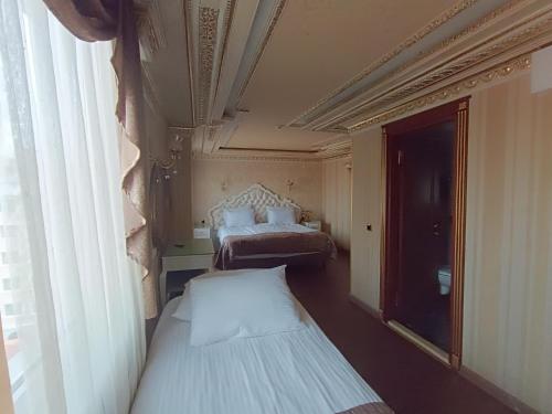 Habitación Triple del hotel Golden Horn - Special Class. Foto 4
