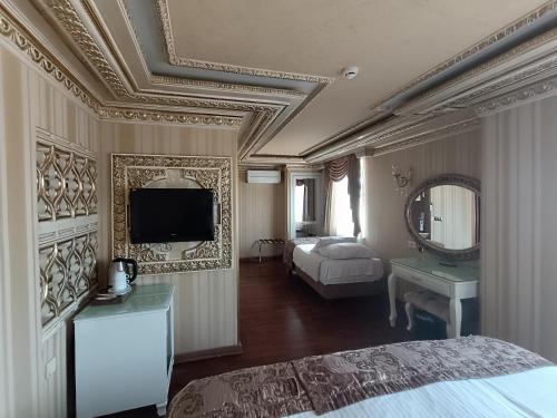 Habitación Triple del hotel Golden Horn - Special Class. Foto 5