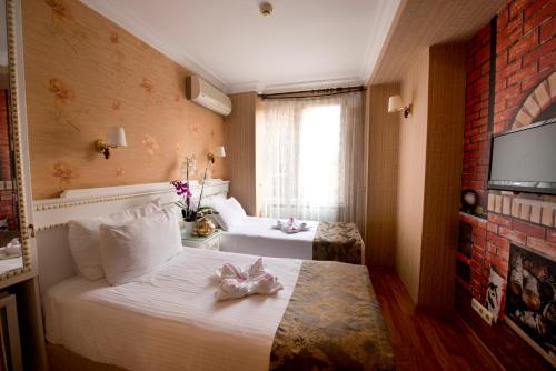 Habitación Doble - 1 o 2 camas del hotel Golden Horn - Special Class. Foto 2