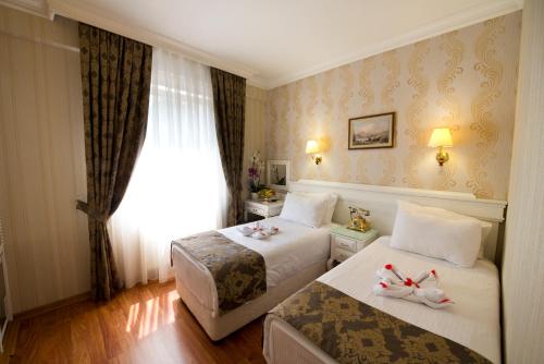 Habitación Doble - 1 o 2 camas del hotel Golden Horn - Special Class. Foto 4