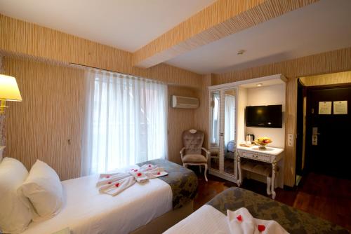 Habitación Doble - 1 o 2 camas del hotel Golden Horn - Special Class. Foto 12