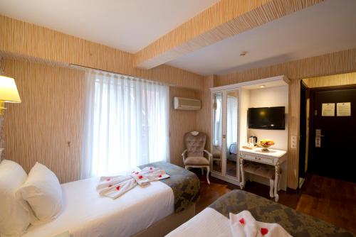 Habitación Doble con cama supletoria - 1 o 2 camas del hotel Golden Horn - Special Class