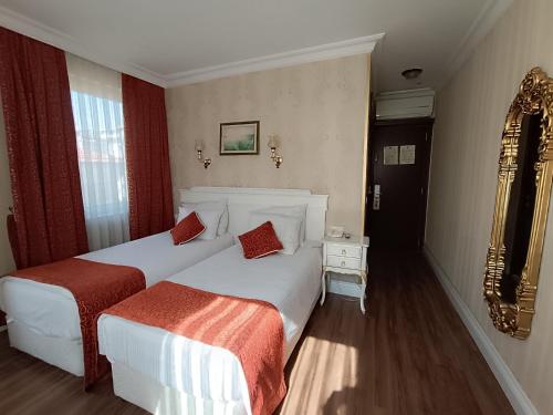 Habitación Doble con cama supletoria - 1 o 2 camas del hotel Golden Horn - Special Class. Foto 6