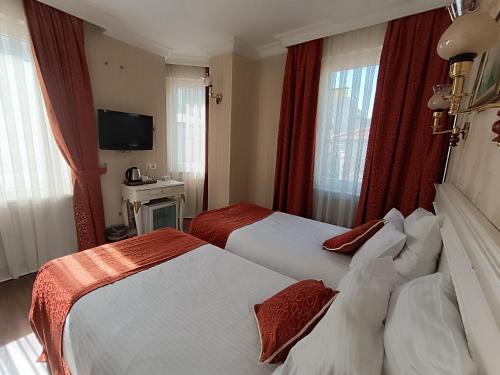 Habitación Doble con cama supletoria - 1 o 2 camas del hotel Golden Horn - Special Class. Foto 8
