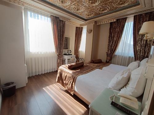 Habitación Doble con cama supletoria - 1 o 2 camas del hotel Golden Horn - Special Class. Foto 9