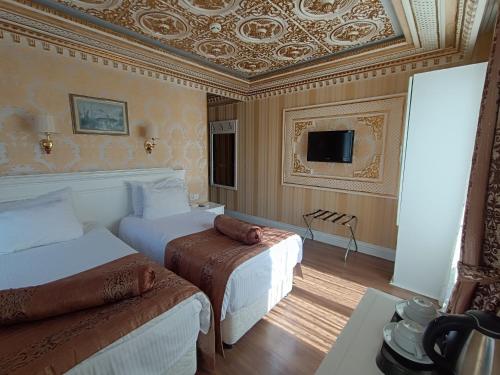 Habitación Doble con cama supletoria - 1 o 2 camas del hotel Golden Horn - Special Class. Foto 10