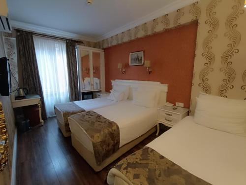 HABITACIÓN FAMILIAR COMUNICADA del hotel Golden Horn - Special Class. Foto 4