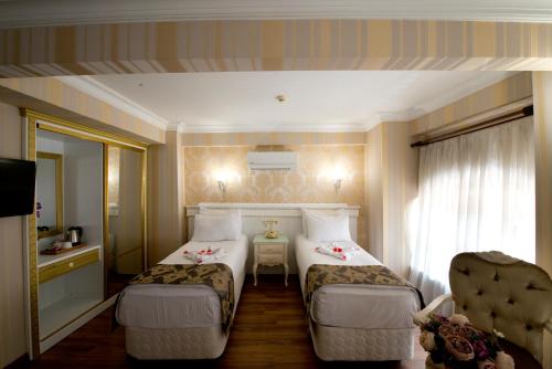 Habitación Cuádruple del hotel Golden Horn - Special Class. Foto 2