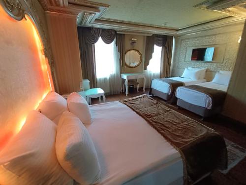 Habitación Cuádruple del hotel Golden Horn - Special Class. Foto 5
