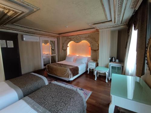 Habitación Cuádruple del hotel Golden Horn - Special Class. Foto 6