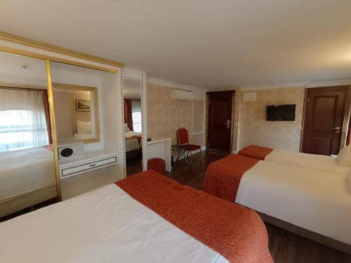 Habitación Cuádruple del hotel Golden Horn - Special Class. Foto 8