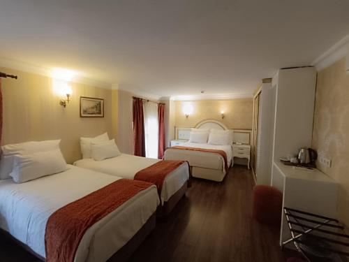 Habitación Cuádruple del hotel Golden Horn - Special Class. Foto 9