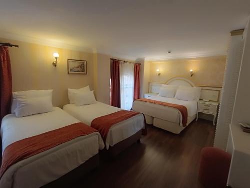 Habitación Cuádruple del hotel Golden Horn - Special Class. Foto 10