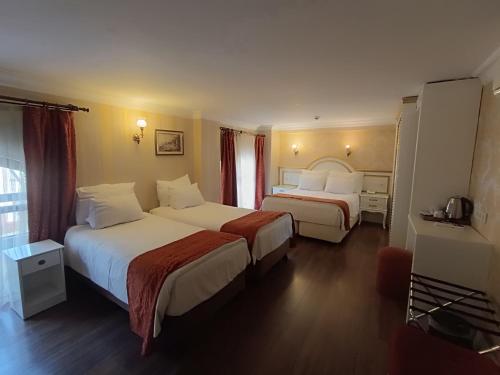 Habitación Cuádruple del hotel Golden Horn - Special Class. Foto 11