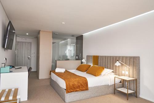 Habitación Deluxe del hotel Alfândega da Fé Hotel & SPA. Foto 4