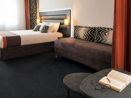 SUITE EXECUTIVE CON 1 CAMA KING SIZE Y 1 CAMA INDIVIDUAL del hotel Mercure Lyon Centre - Gare Part Dieu. Foto 4