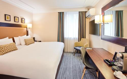 Habitación Deluxe King del hotel Thistle London Heathrow Terminal 5. Foto 1