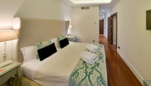 Suite Familiar de 2 dormitorios del hotel Boutique Palacio Pinello. Foto 2