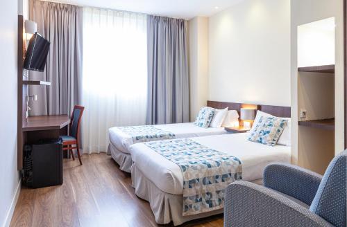 Habitación Doble Estándar - 1 o 2 camas del hotel Olympia Universidades. Foto 2