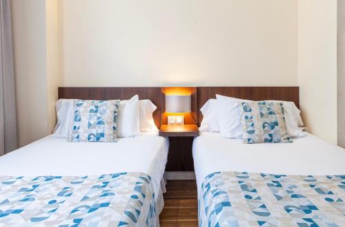 Habitación Doble Estándar - 1 o 2 camas del hotel Olympia Universidades. Foto 5