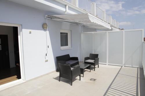 Habitación Doble con Terraza del hotel Olympia Universidades. Foto 3
