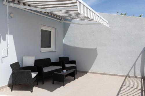 Habitación Doble con Terraza del hotel Olympia Universidades. Foto 5