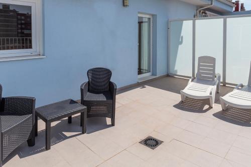 Habitación Doble con Terraza del hotel Olympia Universidades. Foto 6
