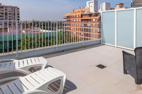 Habitación Doble con Terraza del hotel Olympia Universidades. Foto 7