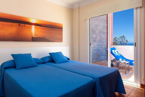 Habitación Familiar con vistas al mar del hotel Terrazas De Los Gigantes