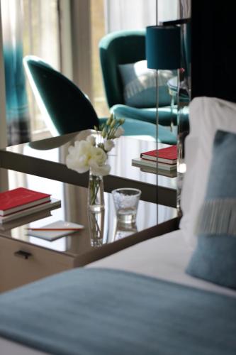 Habitación con vistas al parque del hotel The Athenaeum and Residences. Foto 1