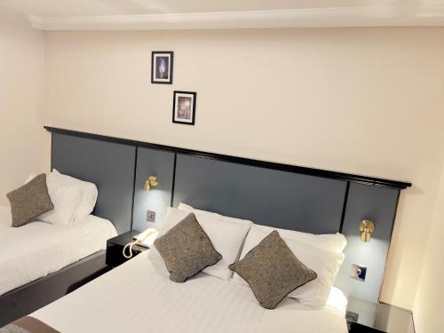 Habitación familiar - cama doble e individuales del hotel Best Western Corona. Foto 5